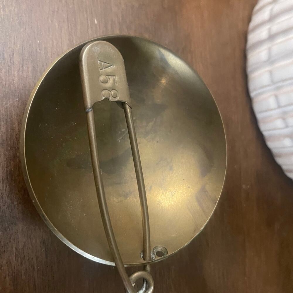 Vintage brass dish with safety pin design 4”